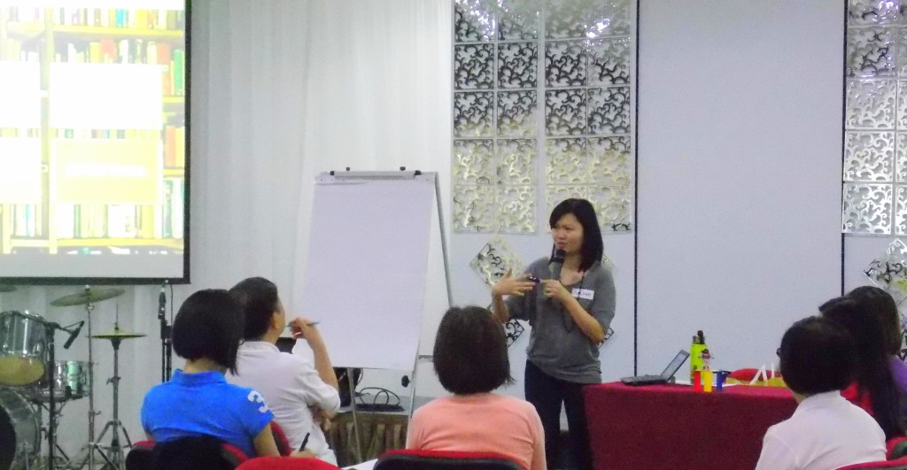 Tan Su Chen speaking in front of the parents who came for the talk