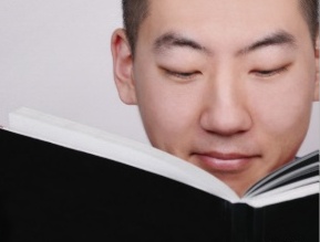 young_asian_man_reading_a_book_poster-rfae6f87256684b84801bb4a44929302e_wv3_8byvr_324