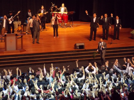 Rev Samuel Rodriguez praying for the attendees