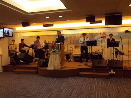 Sr Pr Lawrence Yap with the worship band