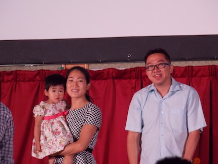 Joshua Hoh Si Peng with his wife and child