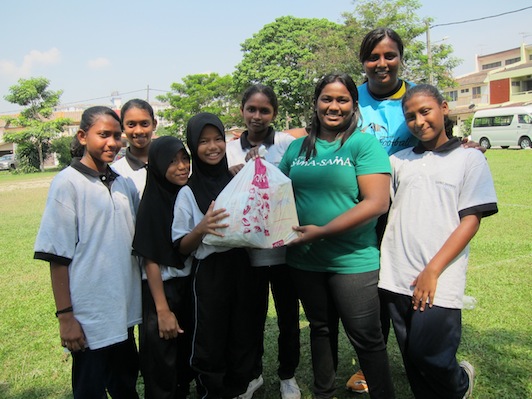 Rachel Shanti (second from right) with the children of her sports program