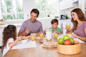 bigstock-Family-eating-healthy-breakfas-42576541