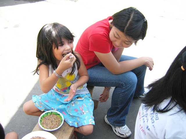 Rachel in a feeding program at a slum area in the Philippines