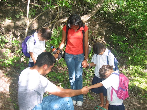 jason_and_ruth_praying_with_children