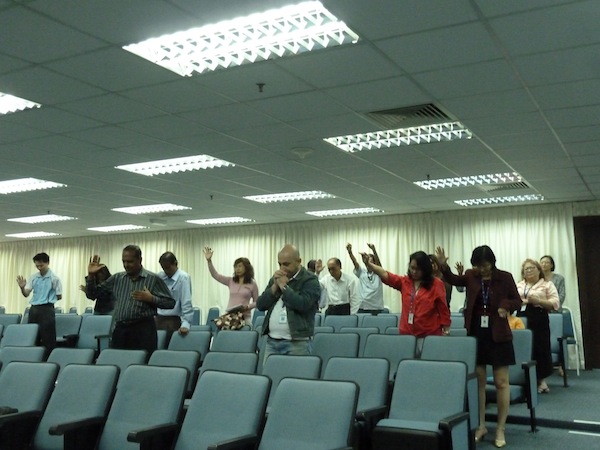 Working adults coming together during the lunch hour to worship God