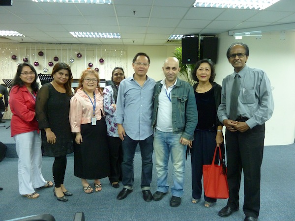 Eddy (4th from right) taking a picture with the people who came to the FGB meeting