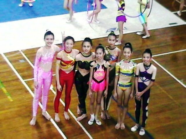 Carey Ng (far left) as a gymnast