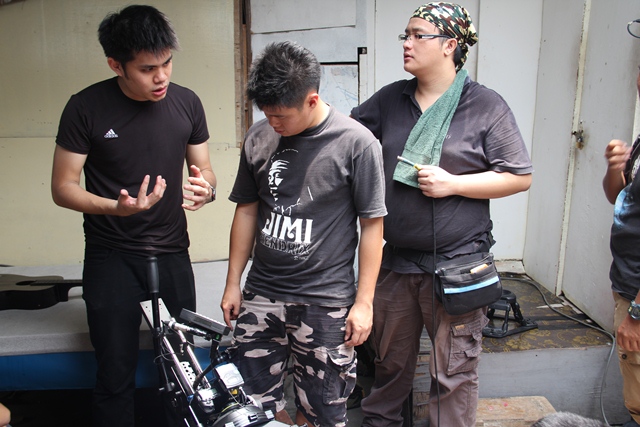 Paul Gan (far left) explaining to his production team