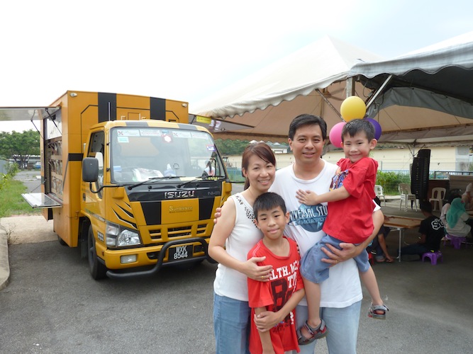 Volunteer Foong Chee Keong from Hope EFC with his wife Hiew Pei Yin and lovely children, Evan (front left) and Elliot (front right)