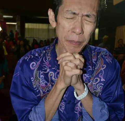 Sr Pr Richard Tong praying to God from Grace Assembly, Klang