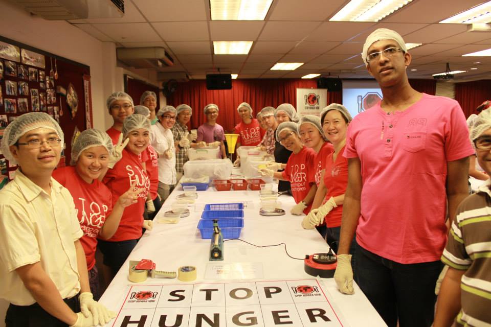 The team preparing to pack the food into boxes