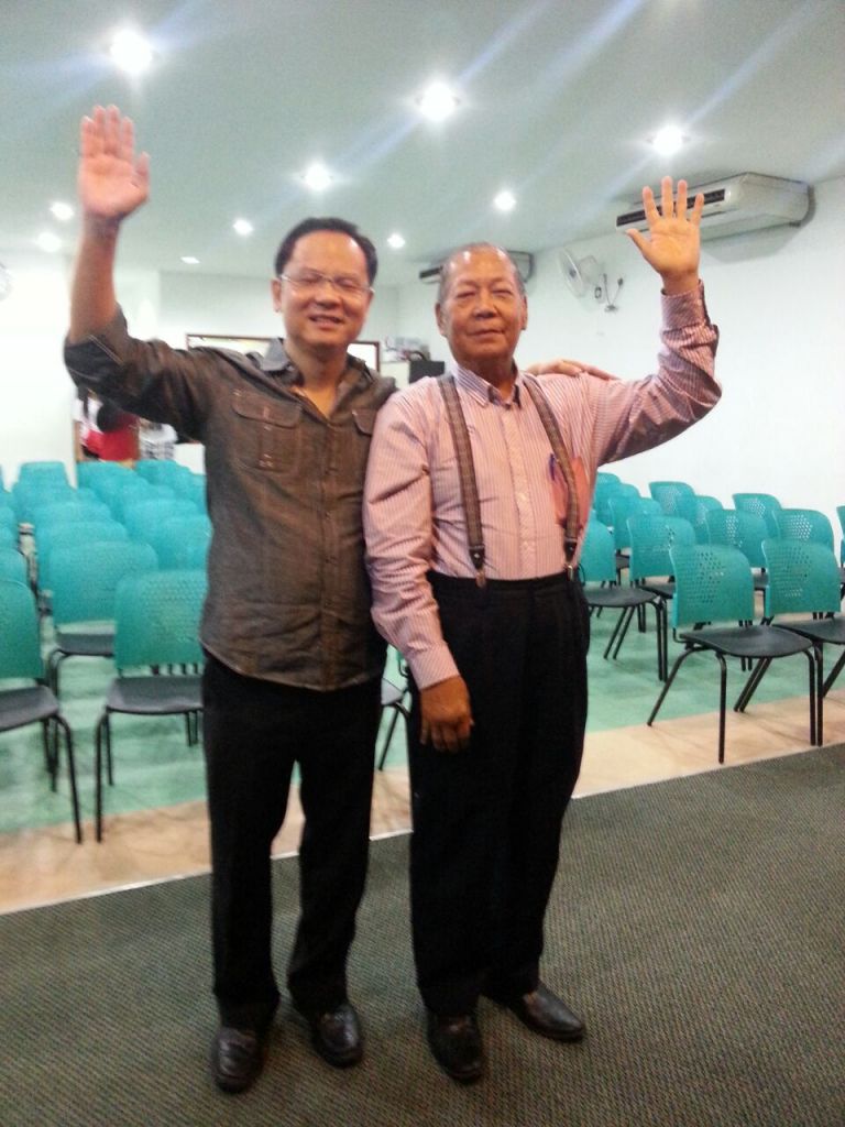 Eddy Yong (left) with a brother-in-Christ who was full in faith