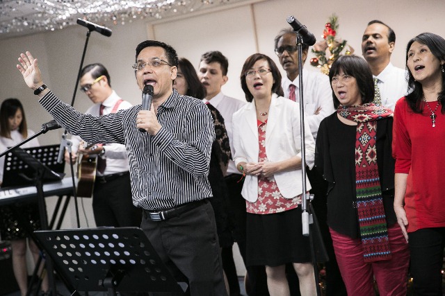 Bryan Gan, emcee of the Christmas party of Menara TA One (front)