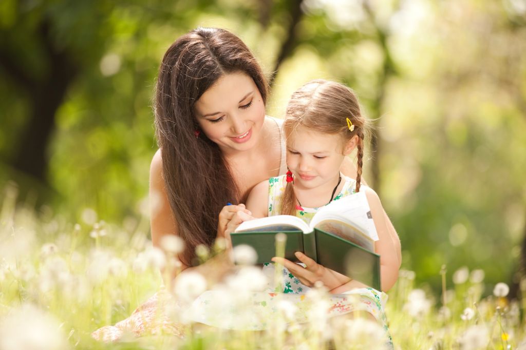 sf-mother-and-daughter-reading-in-a-field