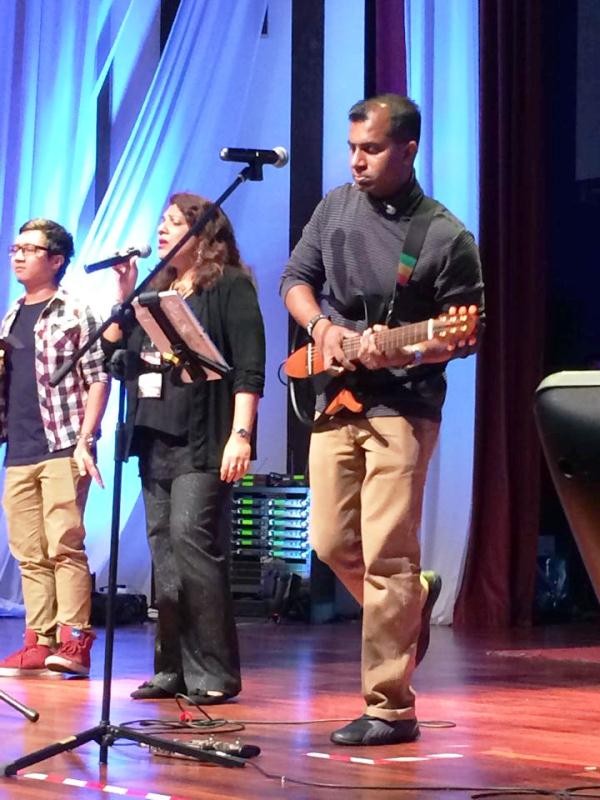 Shamini Ruth (middle) singing with the Global Worship Team of Malaysia at 3 AM