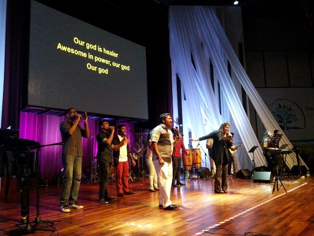 Worshippers of New Creation Revival Centre, KL (Tamil church) praising God together