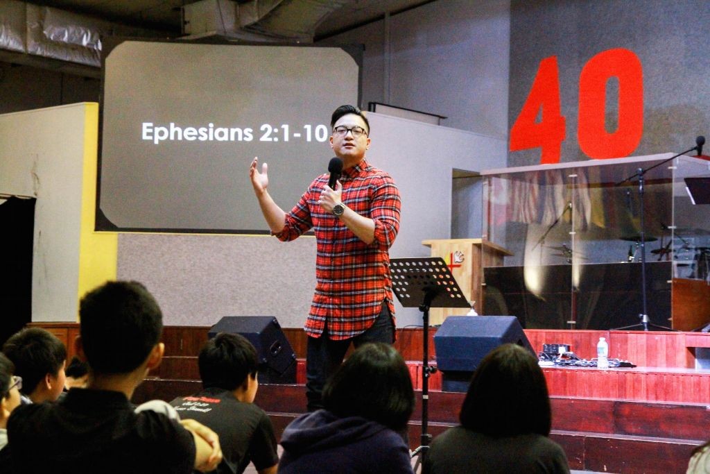 Pastor Jonathan Ngan giving his sermon Photo Credit: Naaman Foong