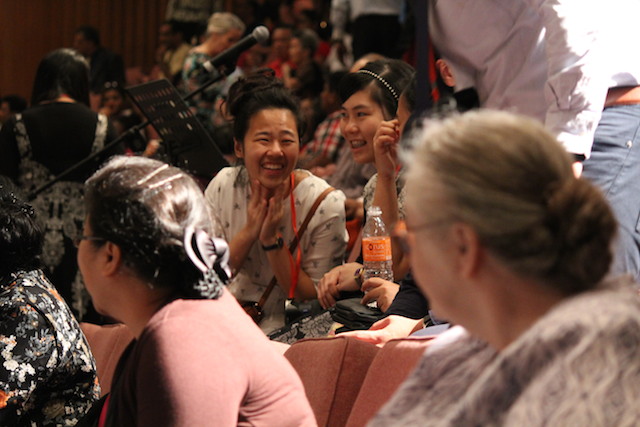 Joyful attendees of the healing crusade