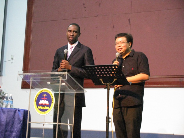 Apostle Suubi with translator Pastor Hii