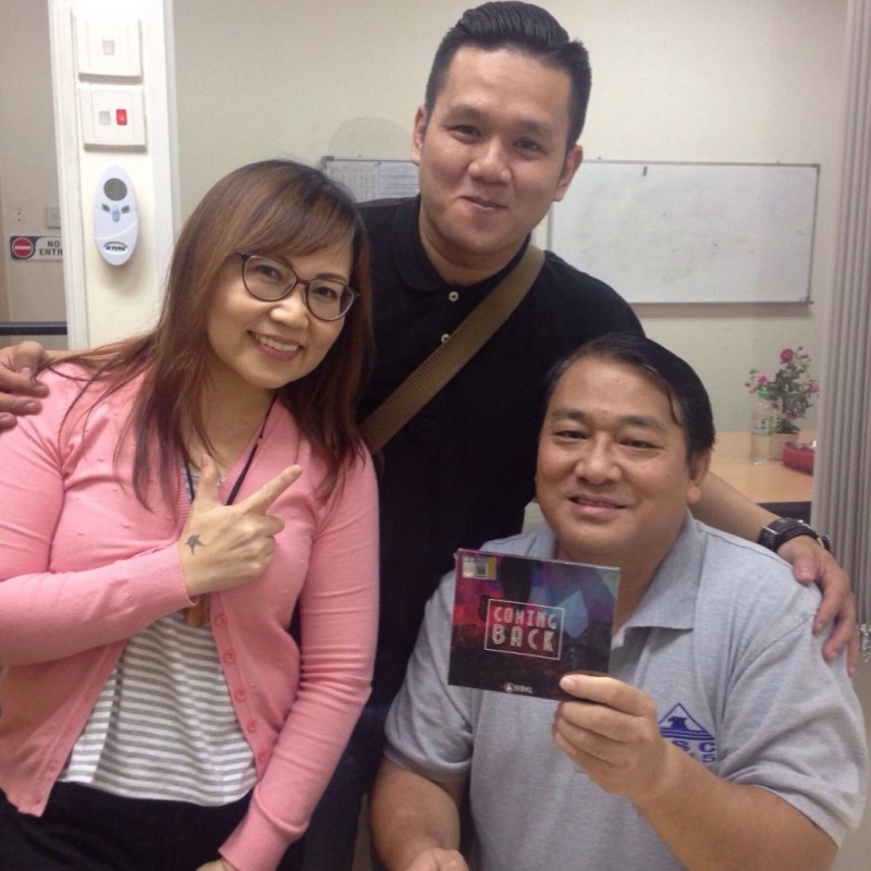 Ricky Sutanto (middle) with Pastor Kenny Tham and his wife