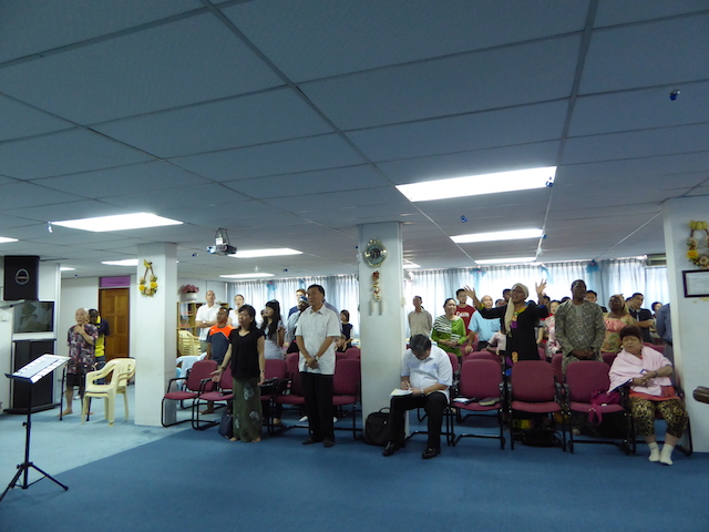 The congregation of First Assembly of God in Kota Bahru worshipping God