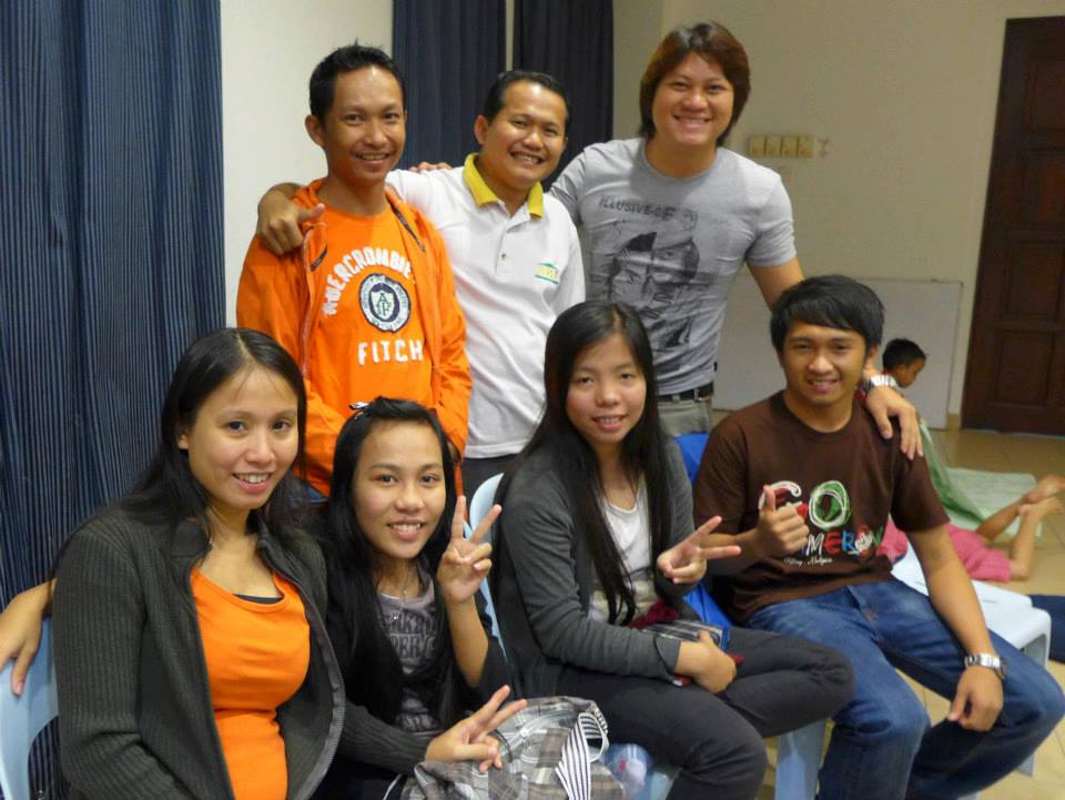 Pastor Nick Resien (back row, middle) with his church members