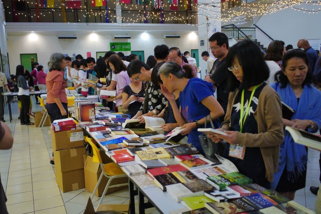 Conferees looking at books after the session. William Taylor's books were also for sale. Photo Credit: Klang Valley Bible Conference