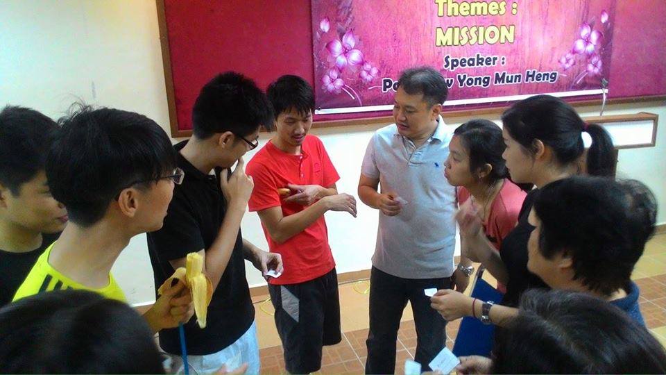 Pastor Jacob Yeng (4th from right) with his church family in a game session of AJPC Family Camp on October 2015