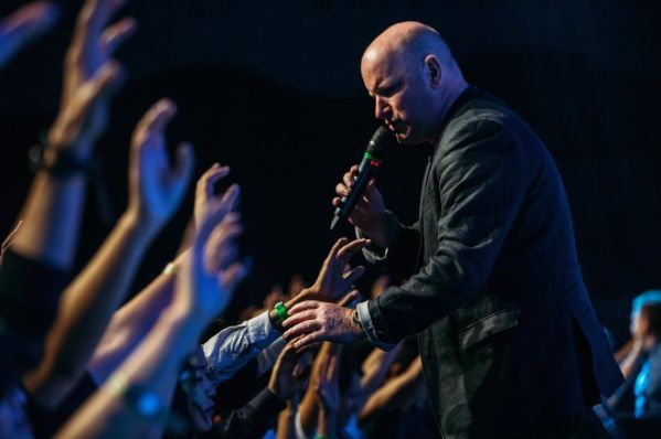 Pastor Russell Evans praying for the youths who came to the Planetshakers Awakening 2016