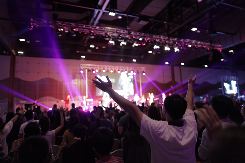 The attendees of Jesus Festival worshipping God