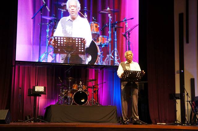 Rev Dr Henry Pillai, Senior Pastor of Grace Assembly giving a message