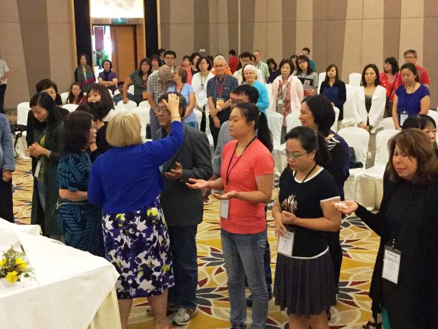 Jill Southern praying for the participants in the 2016 7-day Ellel Conference in Putrajaya