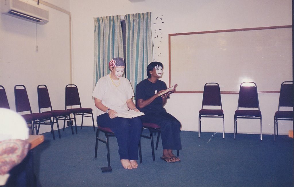 Pari Bala doing a sketch with a crew member of the MV Doulos ship