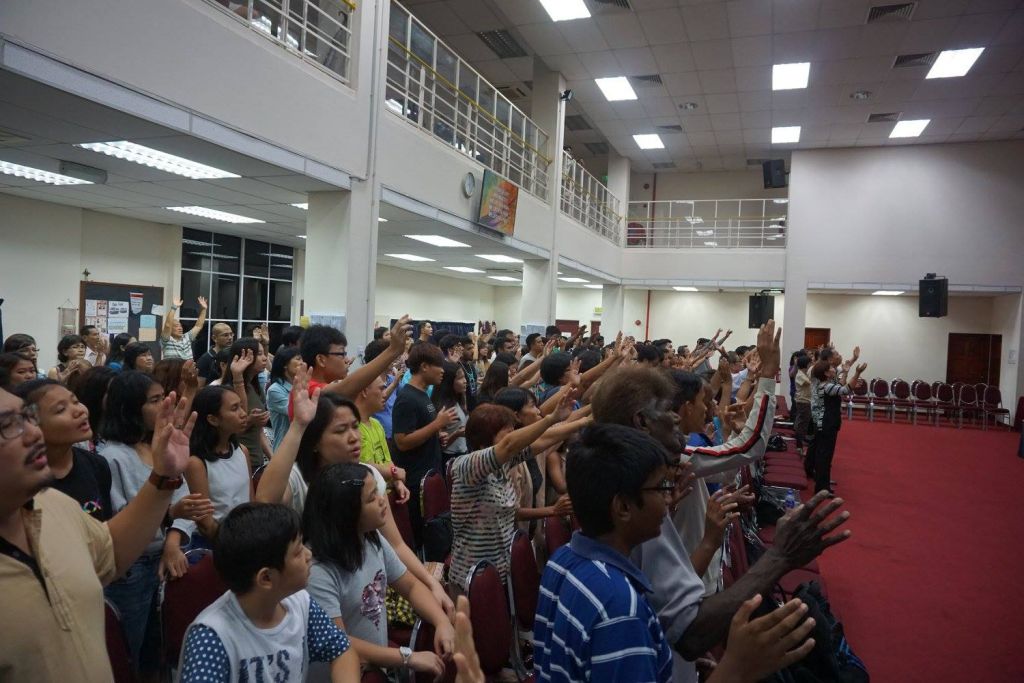 Attendees of FGA Taiping and young adults of the Exponential Camp worshipping God together at FGA Taiping