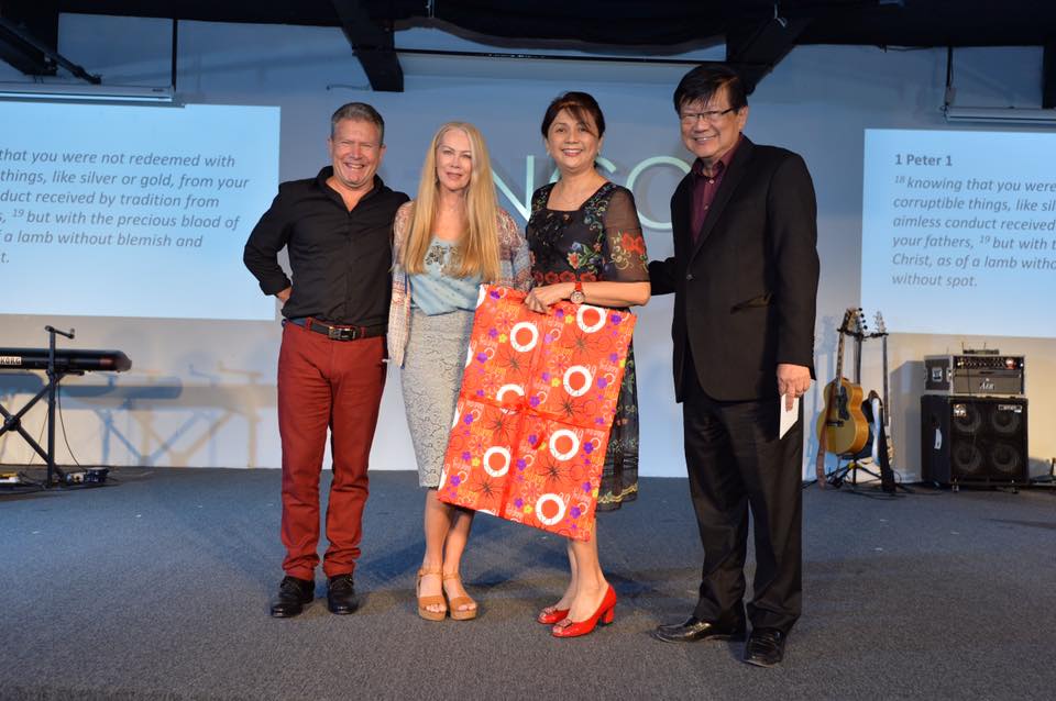 Pastor Rufus (most left) with his wife and Pastor Peter Sze (most right), Senior Pastor of tNCC with his wife