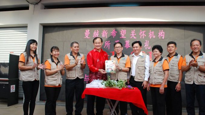 New Hope Center opening ceremony by Reverend Liew Kek Ming (5th from right)