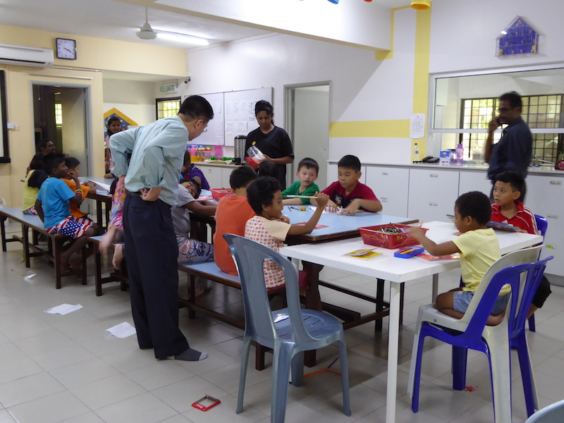 The children gathering together in the dining hall, in SHELTER 1