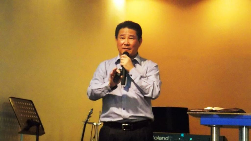 Brother Vincent Leong preaching the Word