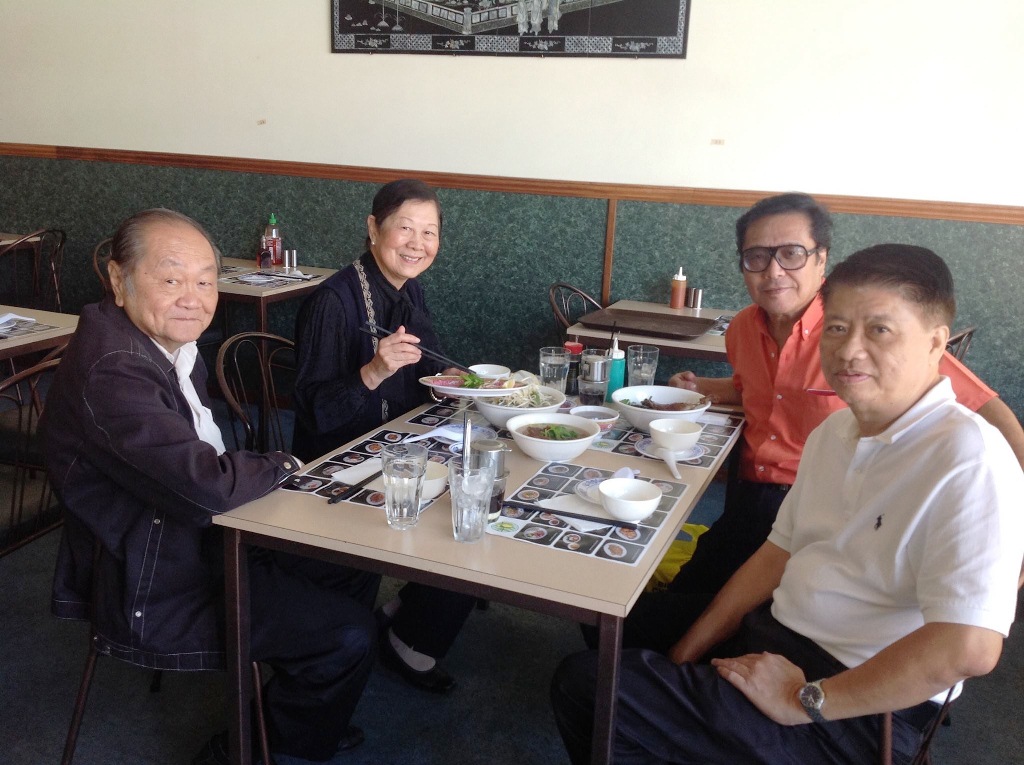 HT Long (Right, back) with Goldie (Left, back) and her husband Tek Chong (Left, front)