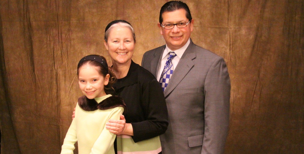 Rev Eli Hernandez (right) and his family